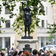 Illustration for article titled Statue of Black Lives Matter Protester Replaces Toppled Statue of Racist Old White Man